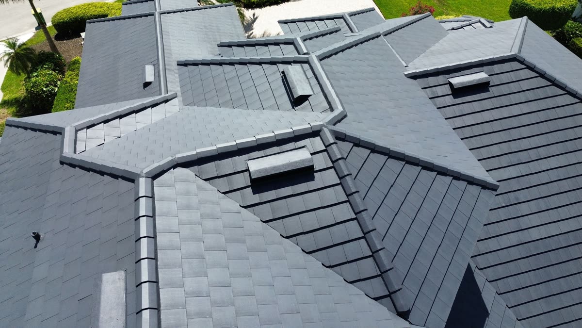 Aerial view of a Southwest Florida tile roof with several off-ridge vents installed across the roof planes